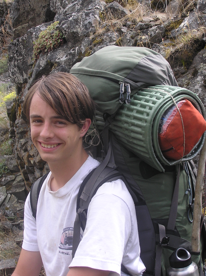 Wolf Camp lead instructor Charlie Borrowman with perfectly packed backpack on shoulders.